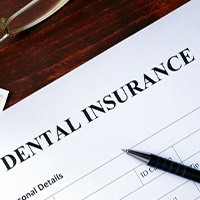 Dental insurance form sitting on a desk