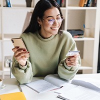 Woman using a credit card