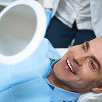 Man smiling at the dental office