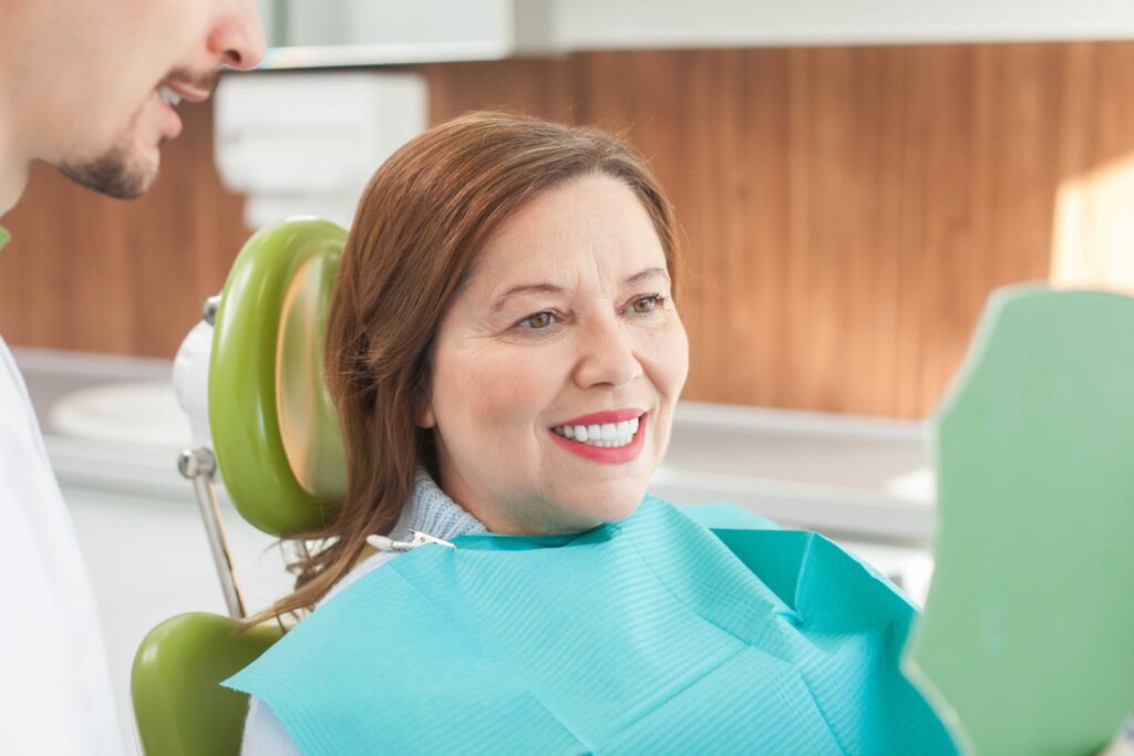 Woman smiling in the dental chair